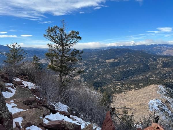 View from the Bear Peak summit with the Rocky Mountains in the distance