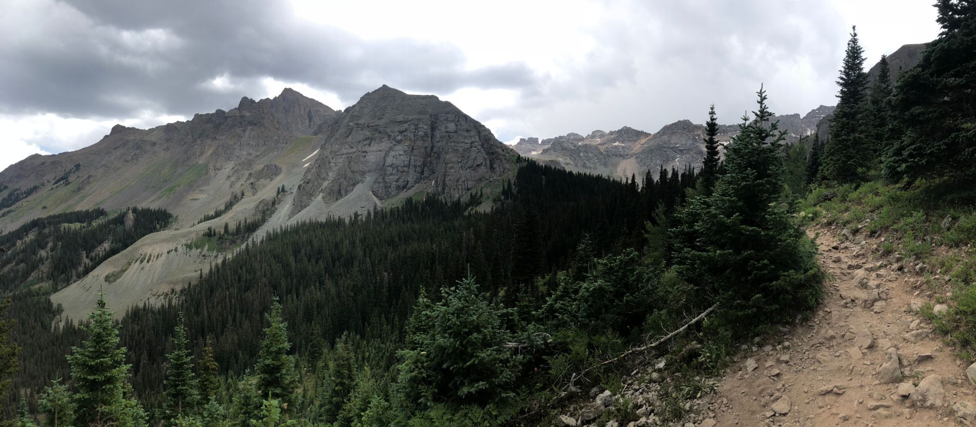 Panorama of the Uncompahgre National Forest, cliffs, and trail we were taking