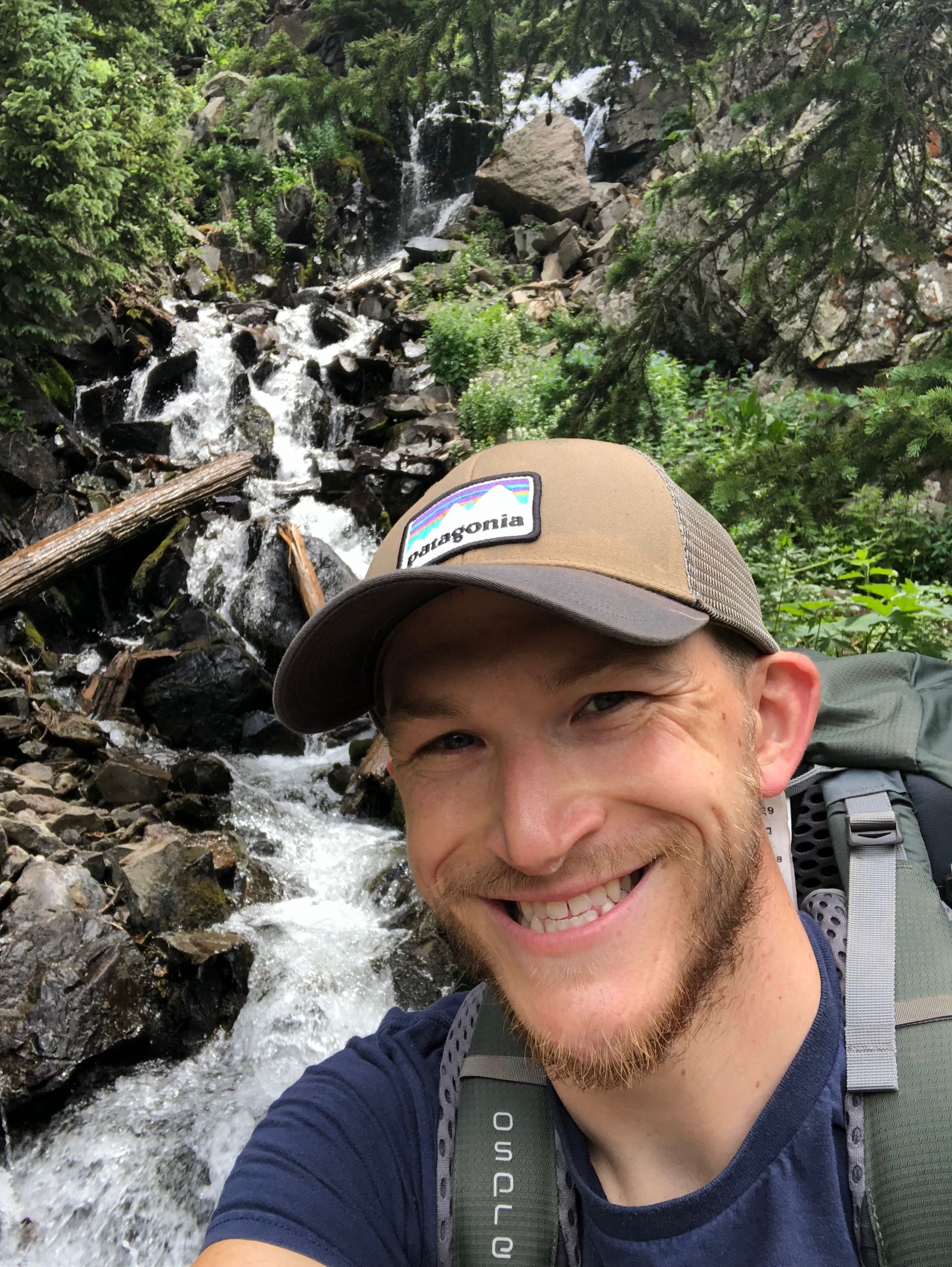 Selfie of me in front of a waterfall