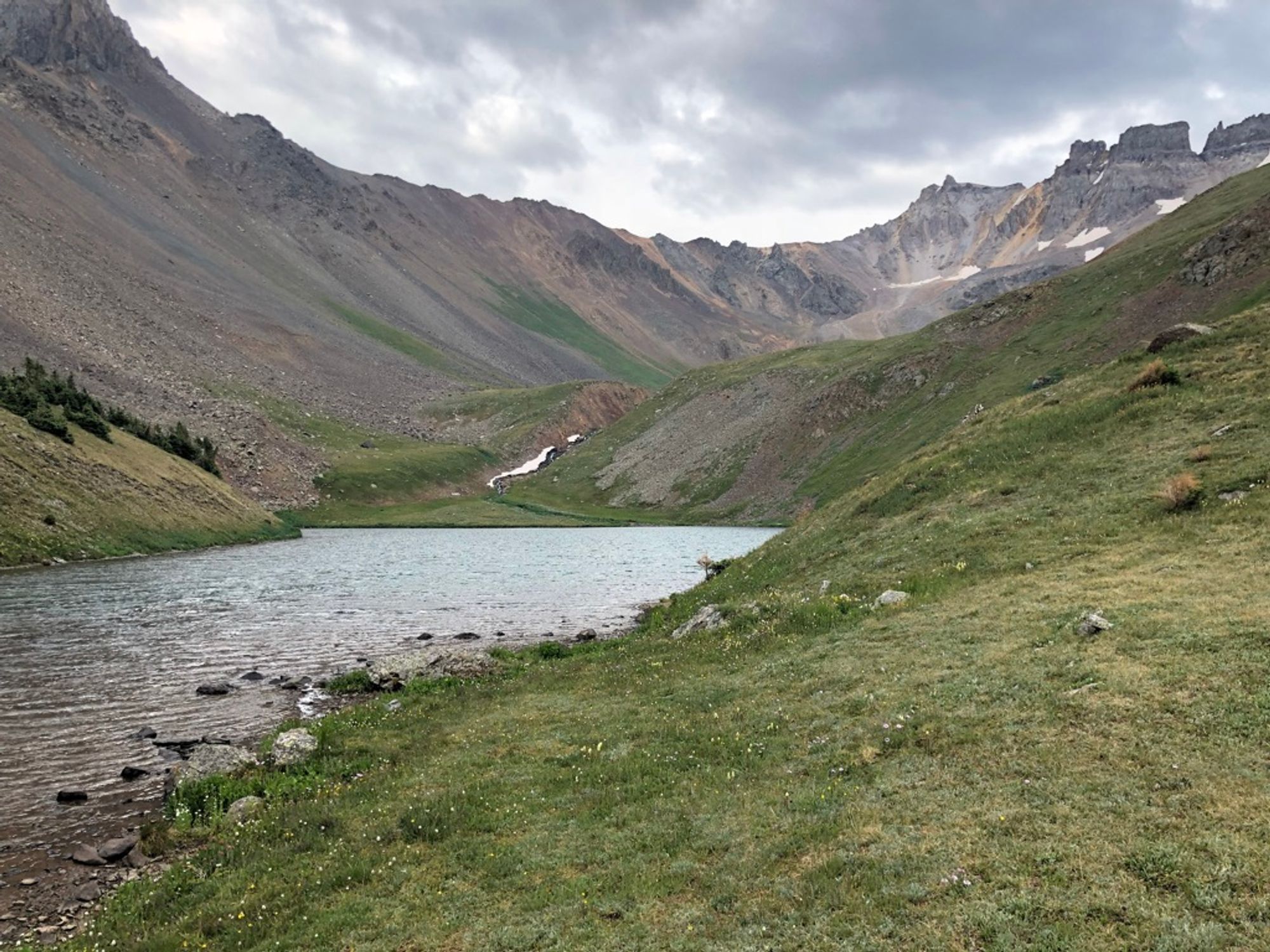 The upper Blue Lake below the towering Sneffels Range ridge line.